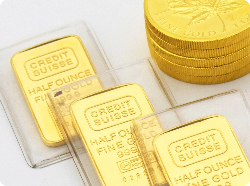 Photo of gold bar and coins